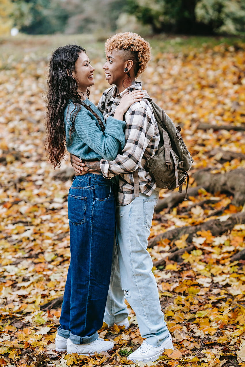 Positive multiracial lesbians hugging in park · Stock, lesbian autumn HD phone wallpaper