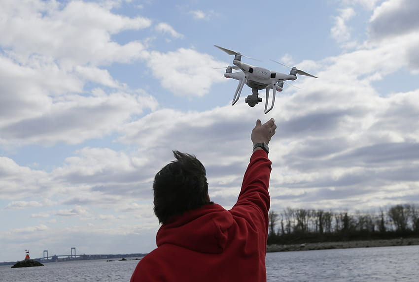 Q&A: A look at what happens when drones get near airports, drone operator HD wallpaper