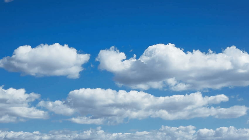 A mediterranean white puffy clouds timelapse on a light blue sky, background sky HD wallpaper