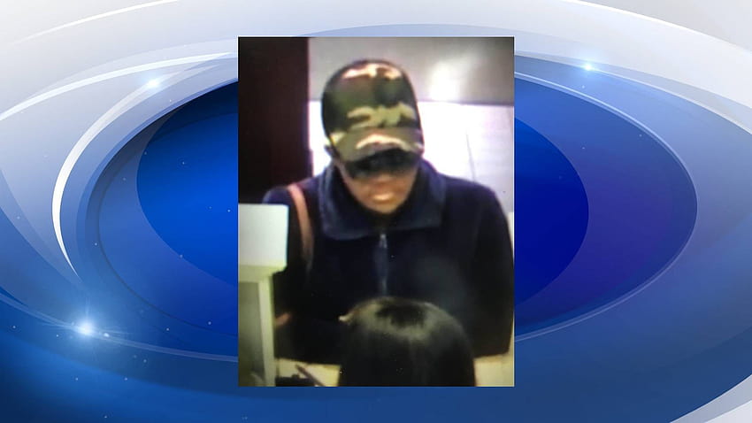 Dispaccio: continua la ricerca di una donna sospettata di rapina in banca a Richmond Co Sfondo HD