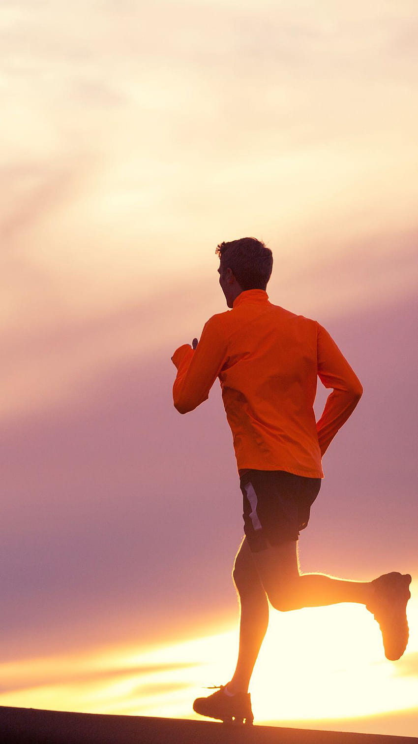 A Man Running At Sunset Mobile HD phone wallpaper