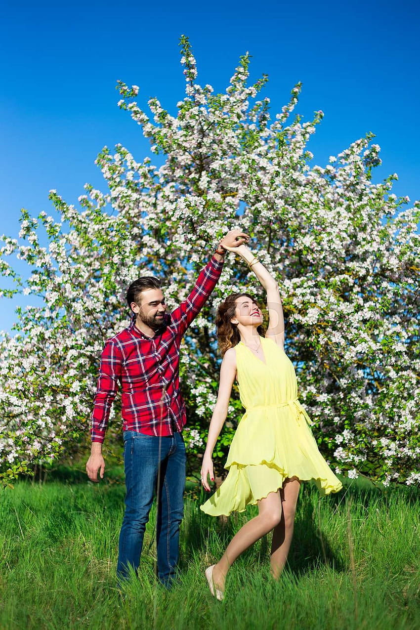 Young Beautiful Couple In Love Dancing In Blooming Garden Garden 