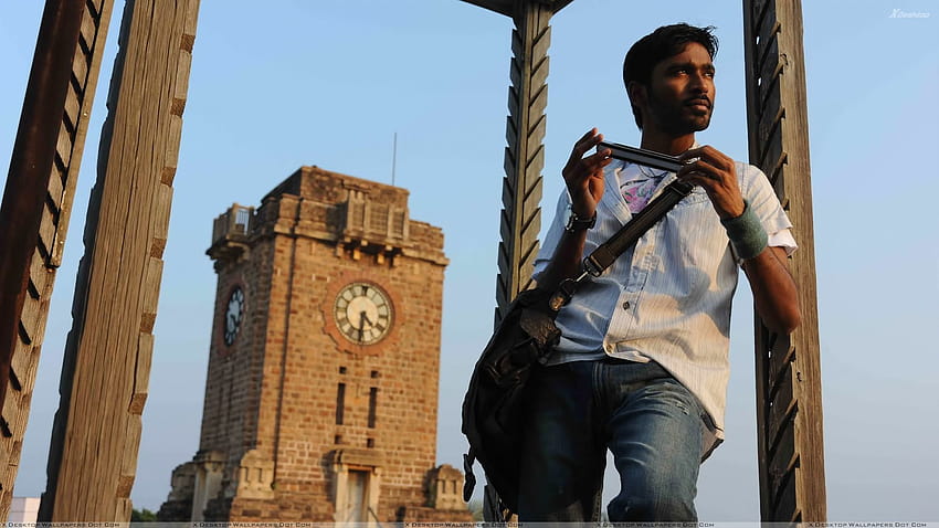 Dhanush-Instrument in der Hand hupen im Kutty-Film HD-Hintergrundbild
