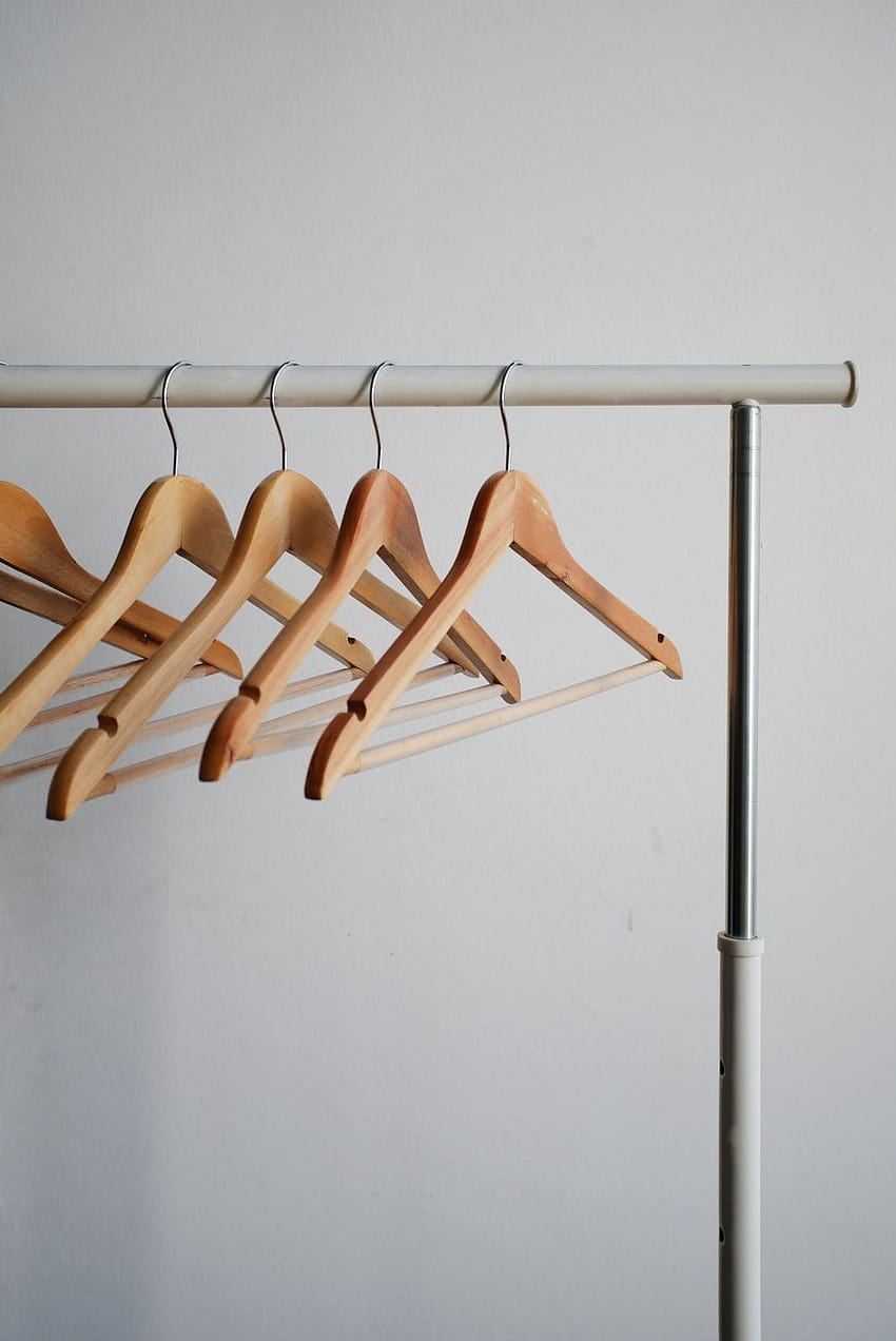 four brown wooden clothes hangers ... HD phone wallpaper