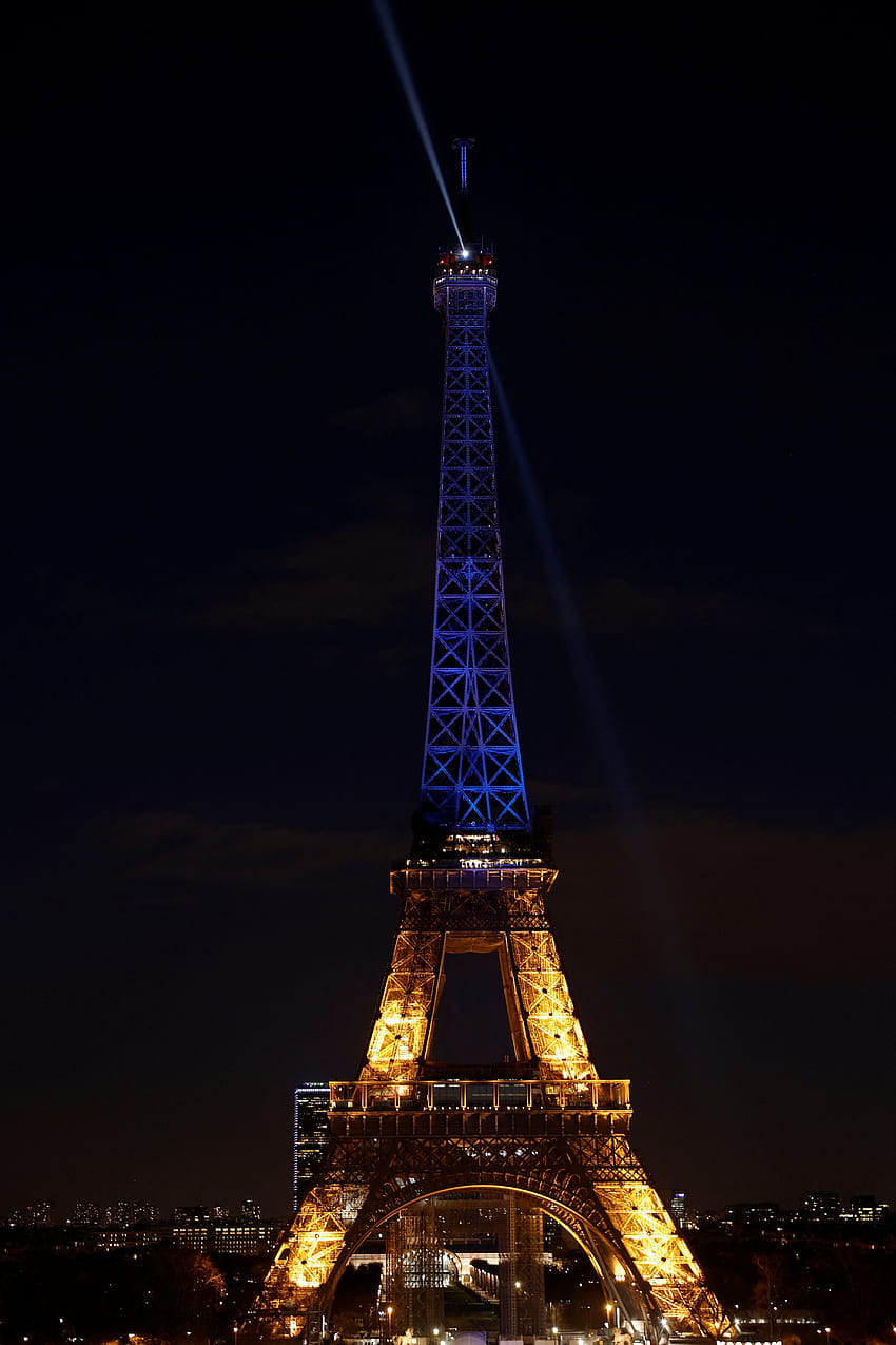 Paris' Eiffel Tower lights up in national colours of Ukraine, eiffel ...