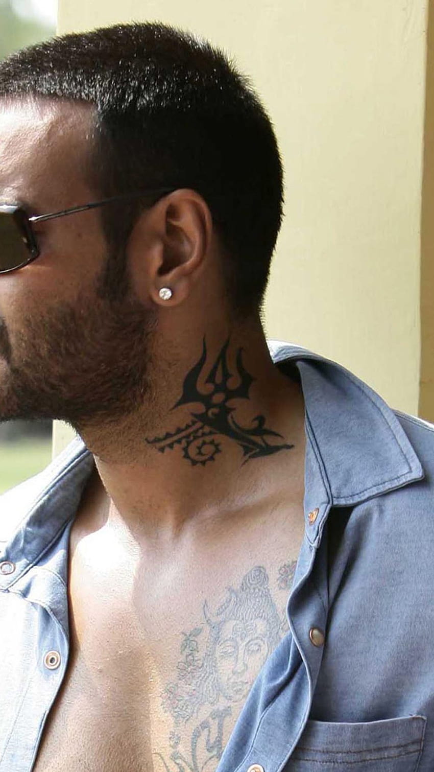 Ajays fan gets inked with Singham tattoo Movie Snippets  India Forums