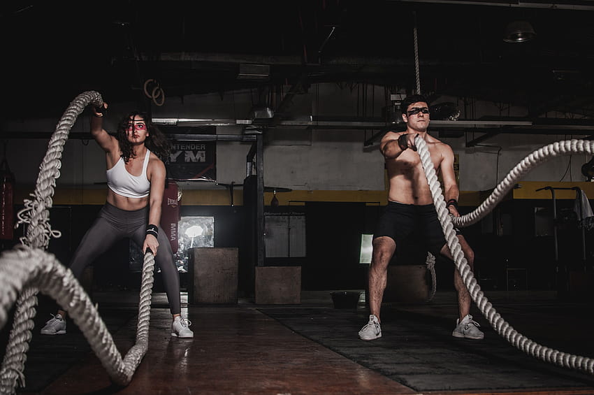 Man And Woman Holding Battle Ropes · Stock, women battle rope HD wallpaper