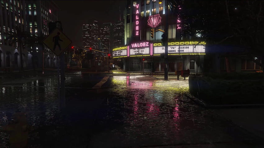 Teatro del centro bajo la lluvia en vivo fondo de pantalla