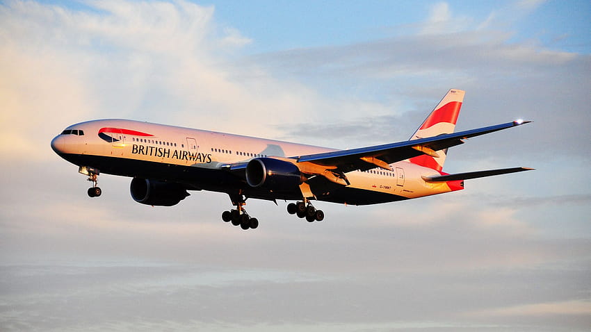 ブリティッシュ・エアウェイズのボーイング 777 が日の出とともに飛行し、 高画質の壁紙