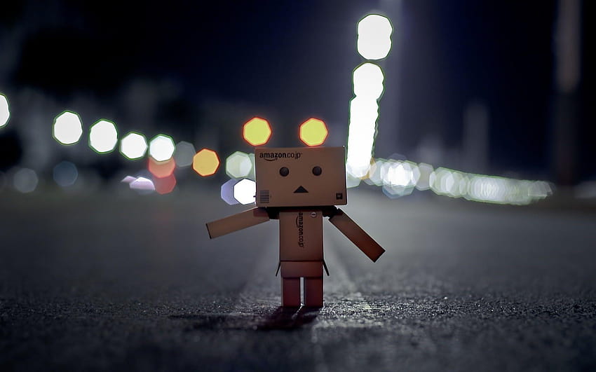 Brown cardboard robot macro with blurred lights backgrounds HD wallpaper