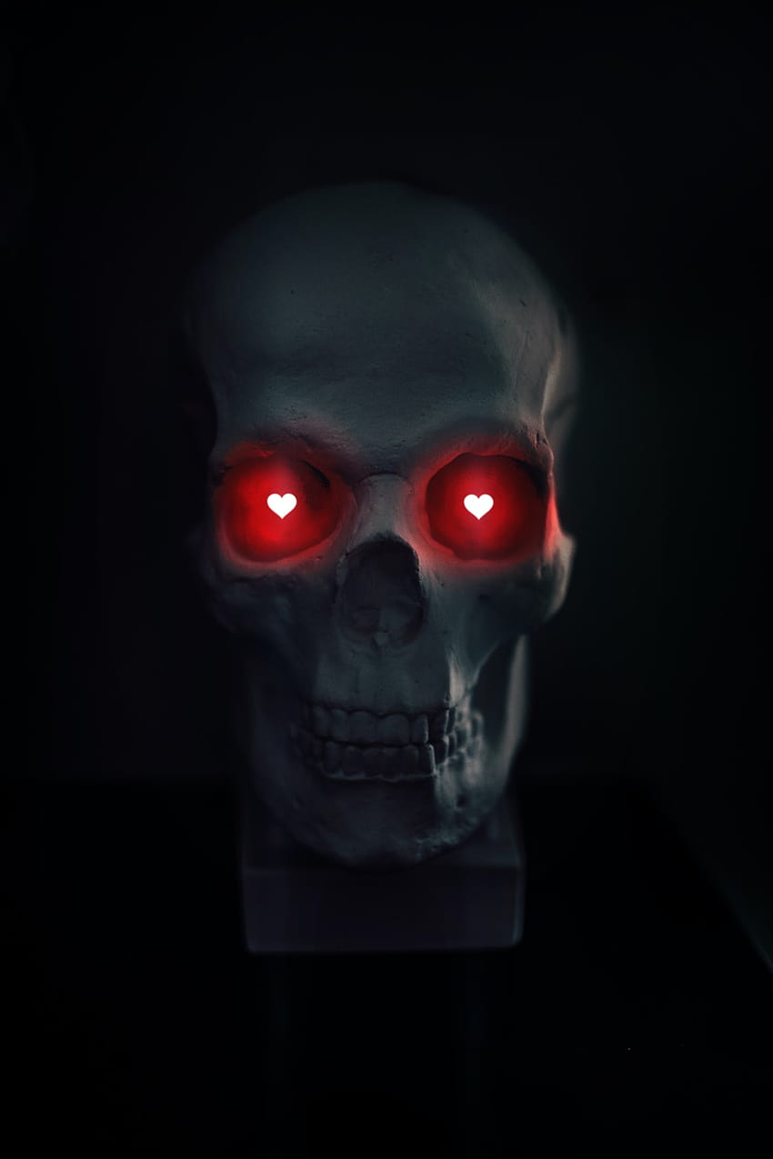 grauer Totenkopf mit roten Augen – Hintergründe, Geisteraugen HD-Handy-Hintergrundbild
