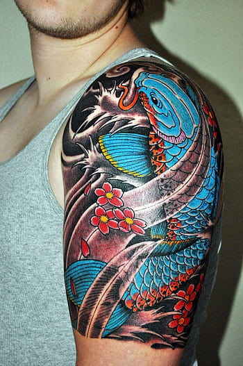 50 Awesome Fish Tattoo Designs  Art and Design  Mens shoulder tattoo Koi  fish tattoo Tattoos for guys
