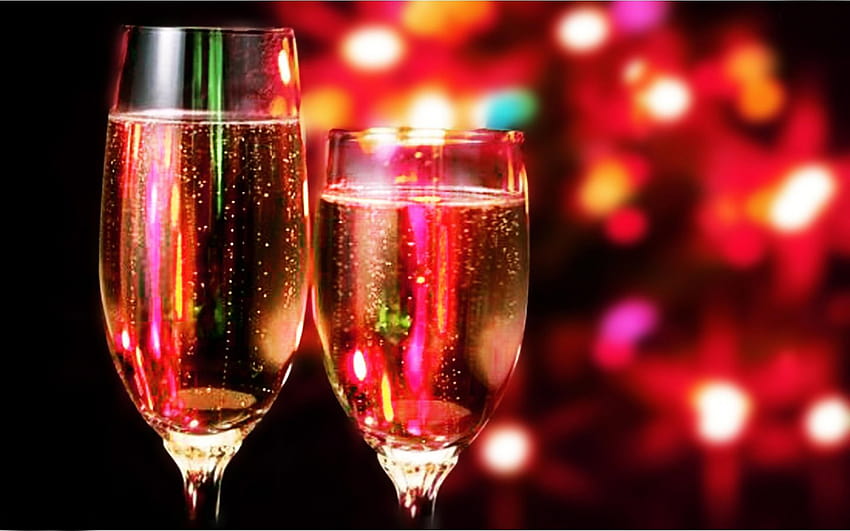 Celebrating New Year with a glass of champagne HD wallpaper