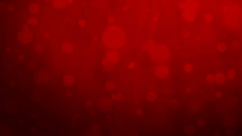 Abstract red backgrounds with floating particles. Seamlessly loopable HD wallpaper