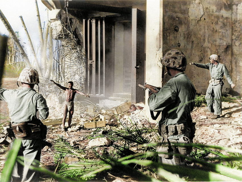 Haunting colorized pics of US Marines fighting one of WWII's bloodiest battles capture Pacific theatre's true horror HD wallpaper