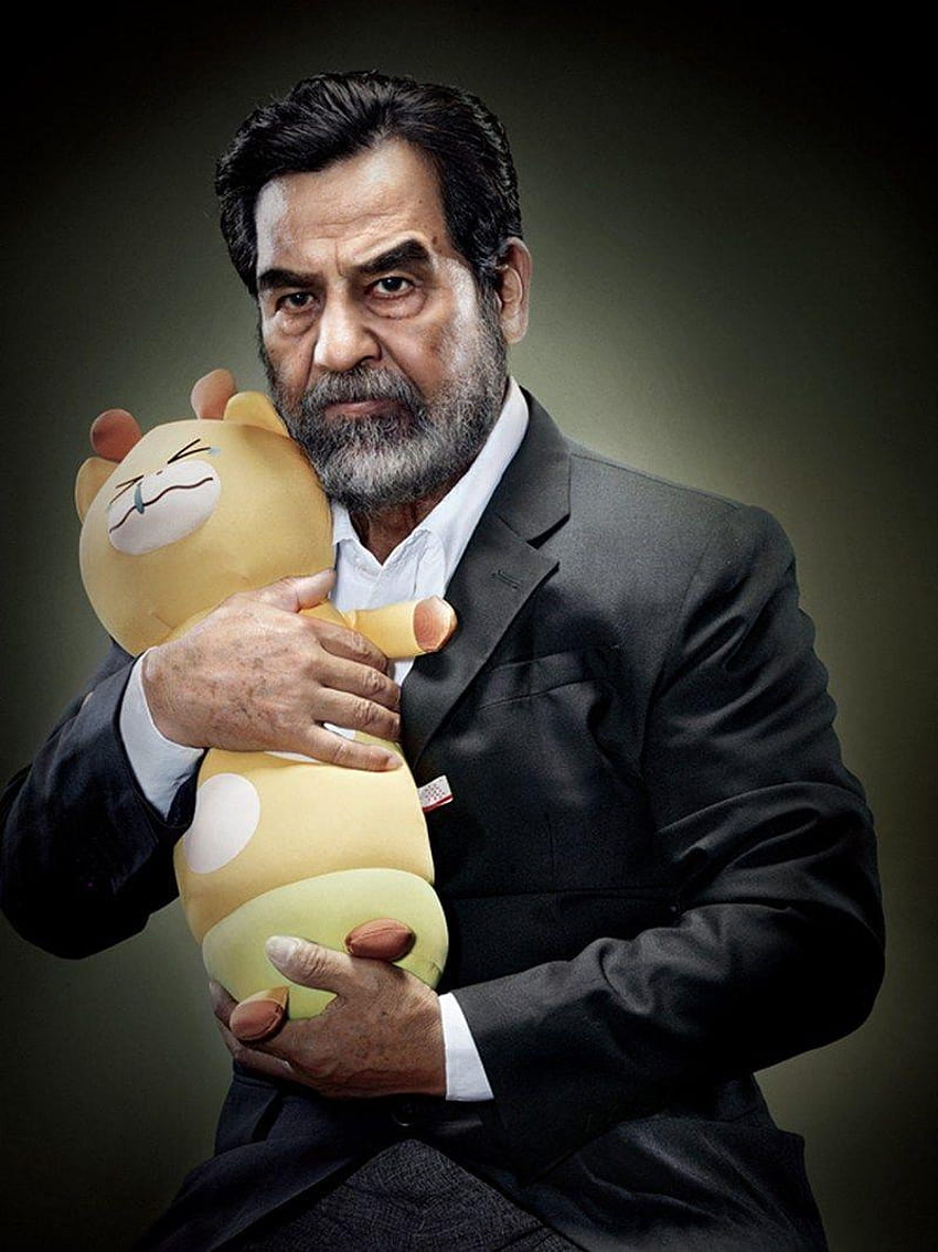 La carineria malvagia che stringe i dittatori dà un lato tenero., Saddam Hussein Sfondo del telefono HD