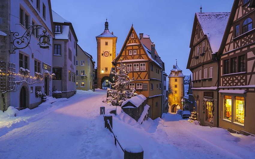 Die Stadt Rothenburg ob der Tauber in Deutschland, an einer Winter-, Winterabendstadt HD-Hintergrundbild