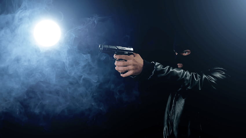 masked criminal gangster holding gun black backgrounds Stock Video, background gangster HD wallpaper
