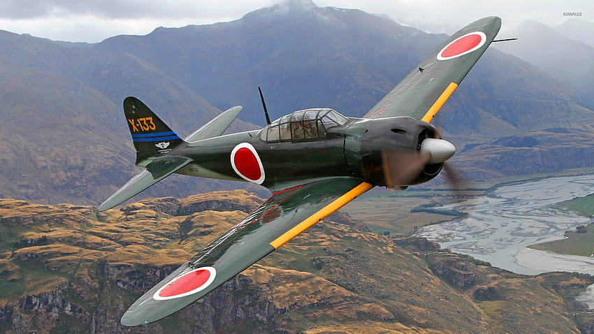 Mitsubishi A6M Zero fliegt über die Hügel HD-Hintergrundbild
