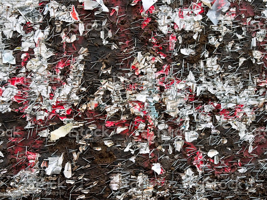Muchused Notice Board Covered In Staples And Paper Shreds Stock HD wallpaper