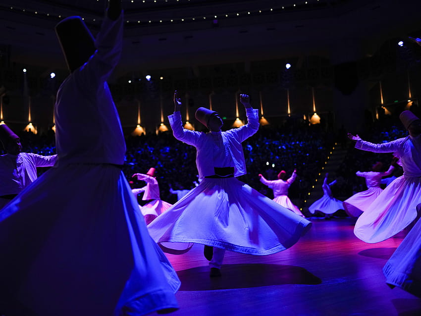 : Rytuał wirujących derwiszów ku czci Rumiego, mistycznego poety sufickiego, taniec sufi Tapeta HD