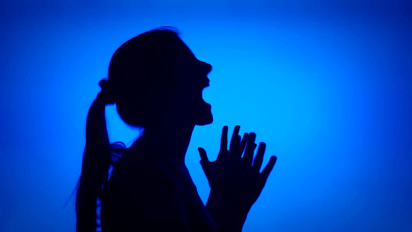 Silhouette of young frustrated woman crying. Female's face in profile screaming in despair on blue background. Black contour shadow of teenager's, furious HD wallpaper