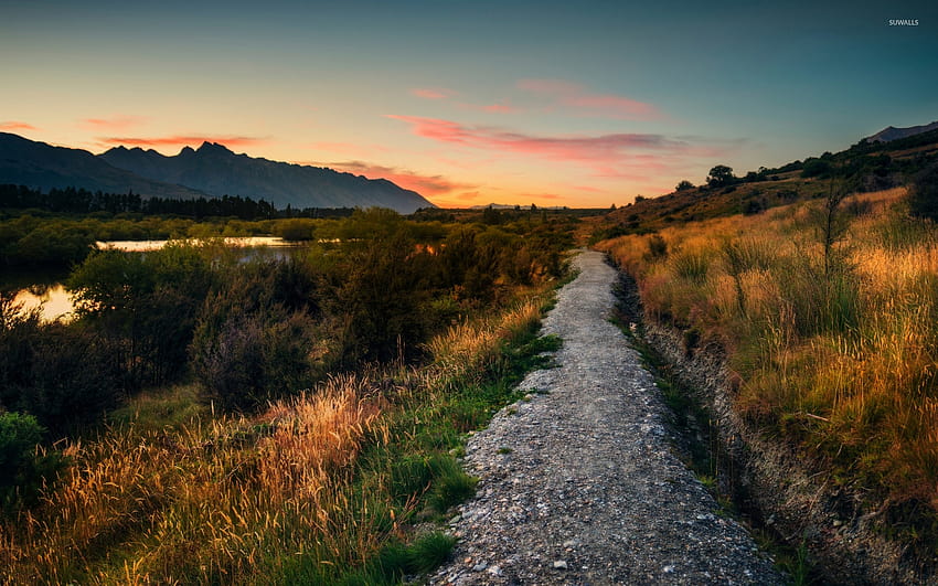 Stone path on the river side towards the sunset, light path HD wallpaper