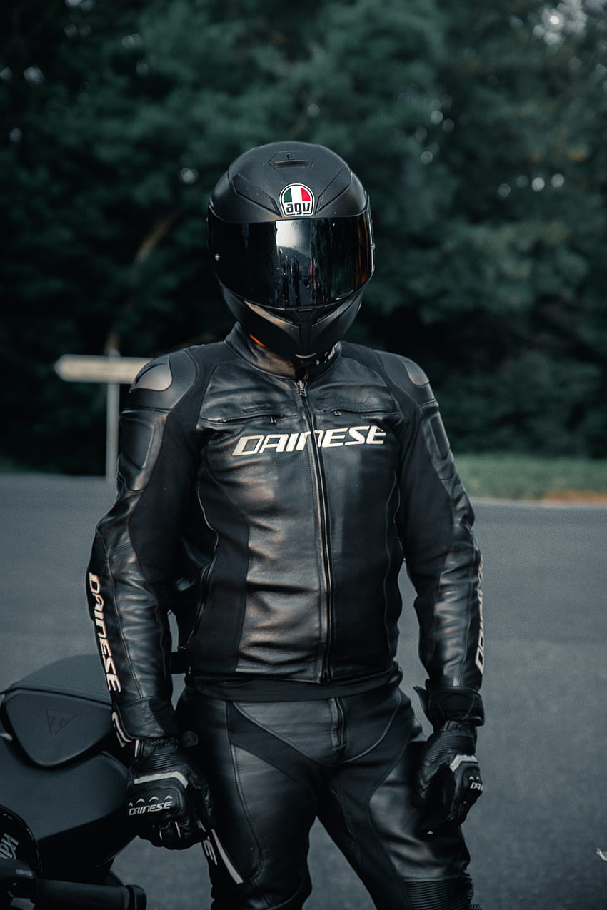 Man Wearing a Leather Jacket and a Black Helmet · Stock, black outfit and helmet HD phone wallpaper
