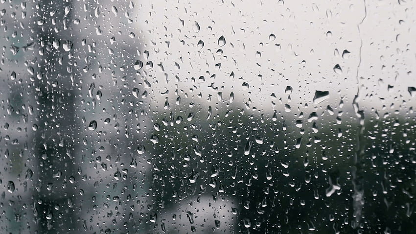 Gotas de chuva em uma vidraça, prédios ao fundo. Vídeo de estoque, fundo de pingos de chuva de janela papel de parede HD
