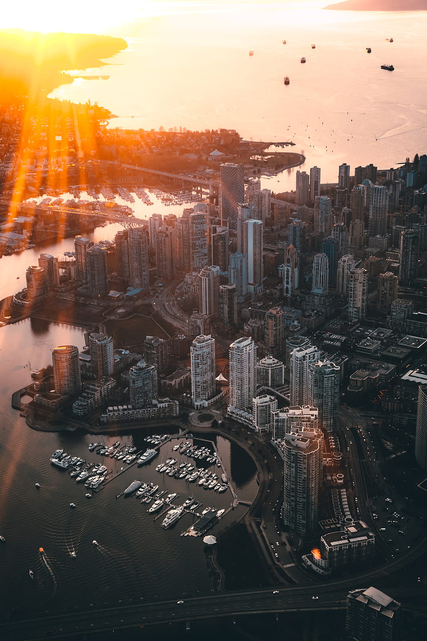 Vista aérea da cidade durante o pôr do sol · Estoque, vista aérea Papel de parede de celular HD