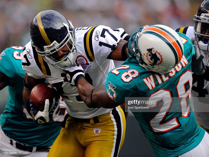 New York Jets wide receiver Braylon Edwards stiff arms Miami Dolphins... News HD wallpaper
