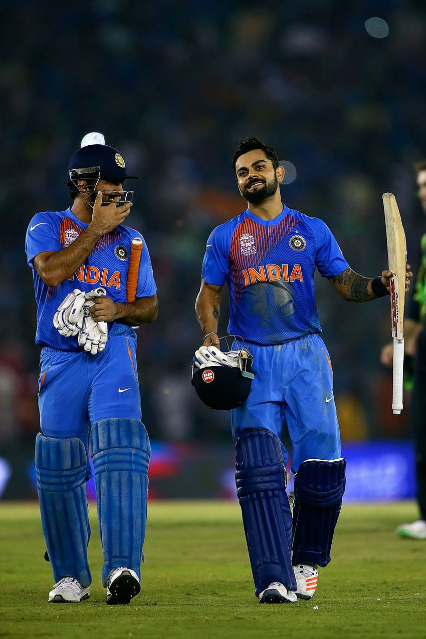 MS Dhoni and Virat Kohli share a laugh after taking India home HD phone wallpaper