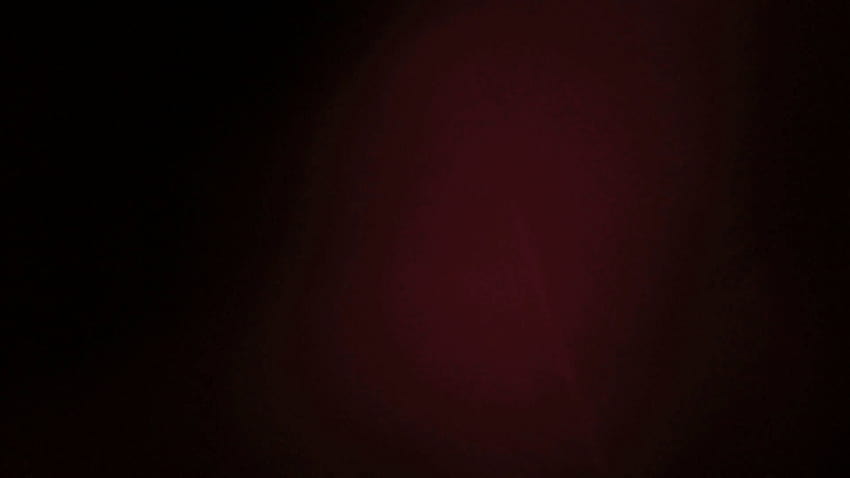 Subtle light leak on black background, moving red lens flare, vintage black background HD wallpaper