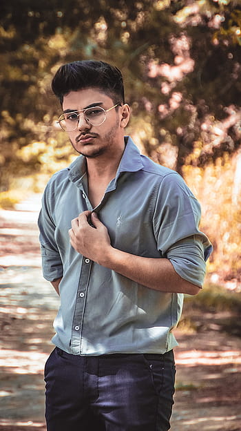 Indian Male Model In Side Pose With Sunglass Stock Photo, Picture and  Royalty Free Image. Image 63815570.