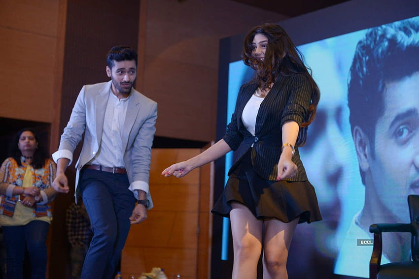 Utkarsh Sharma and Ishita Chauhan shake a leg shake a leg as they promote their Bollywood film 'Genius' in Mumbai HD wallpaper