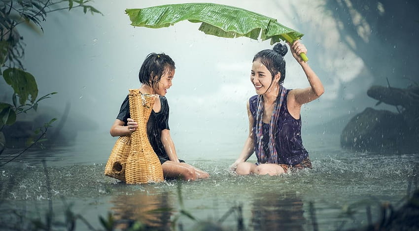 Happy Mom And Son Standing In The Rain HD wallpaper
