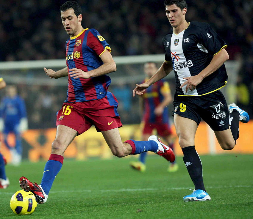 Barcelona Sergio Busquets on the football field and HD wallpaper