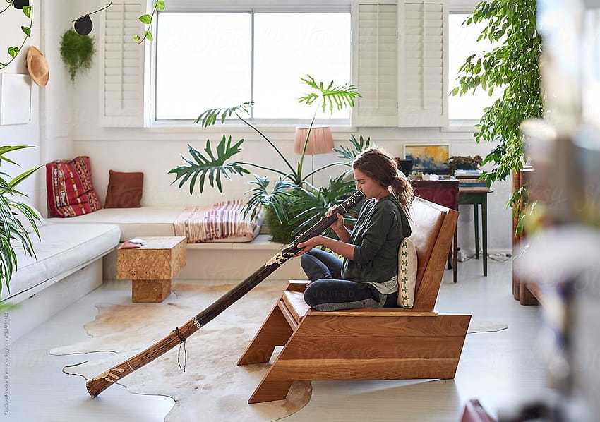 Hippy Woman Playing Didgeridoo At Home HD wallpaper