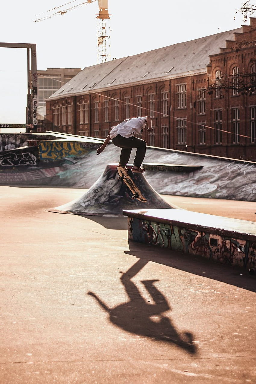 man riding skateboard near door – Person, skateboarding aesthetic HD phone wallpaper