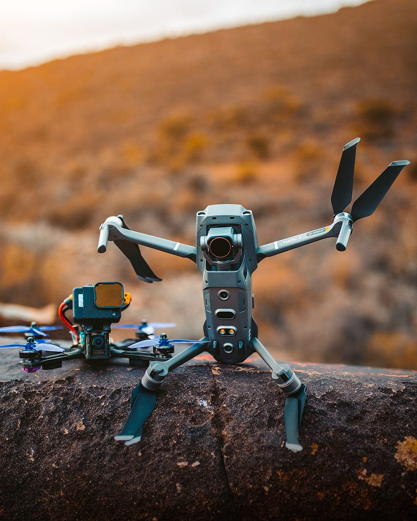 gray and black drone on brown rock during daytime – Toy on HD phone wallpaper