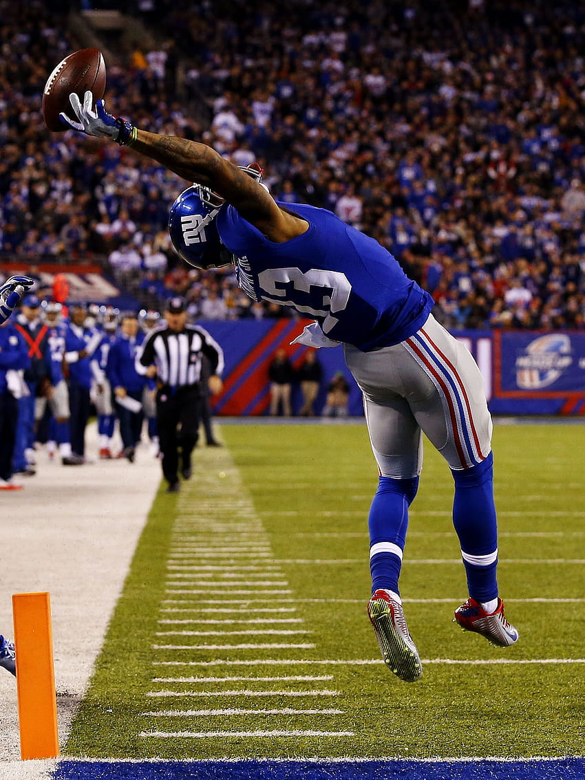 If you haven&seen Odell Beckham Jr.&insane catch by now, watch it here, but also check out these fro…, football one handed catches HD phone wallpaper