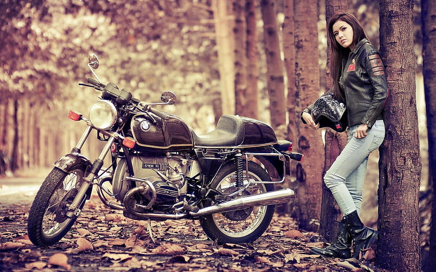 Beautiful asian biker girl with her BMW motorcycle in the forest HD wallpaper