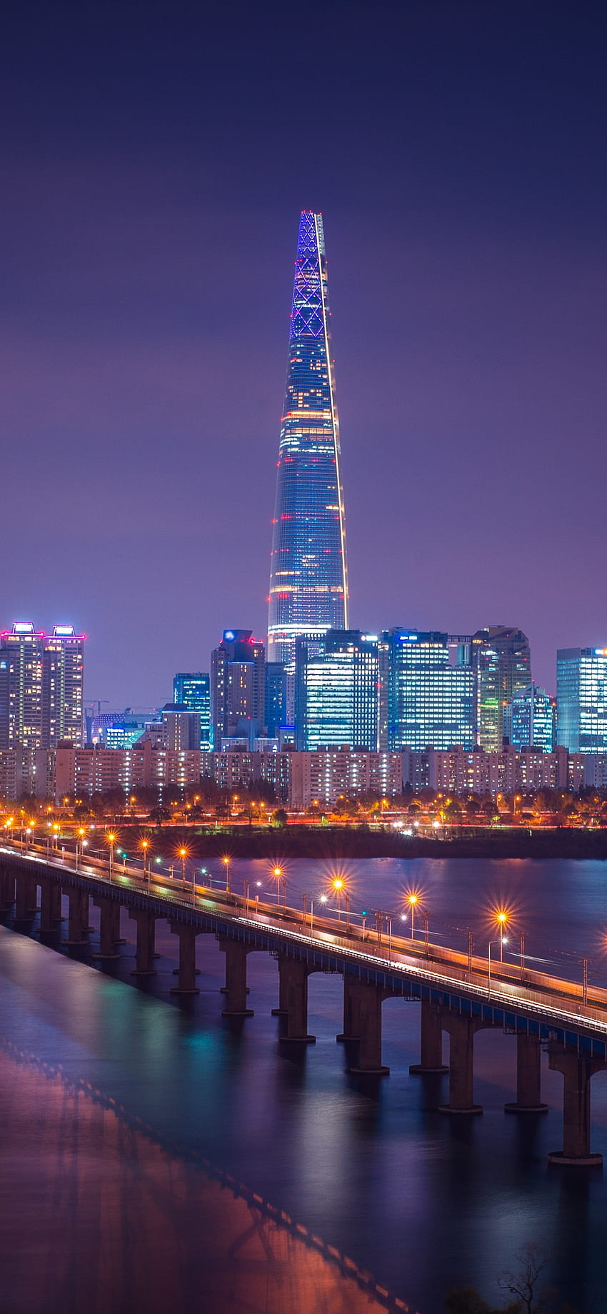 Lotte Tower, Seúl, paisaje urbano, puente, noche, luces de la ciudad, mundo, londres iphone 12 pro max fondo de pantalla del teléfono