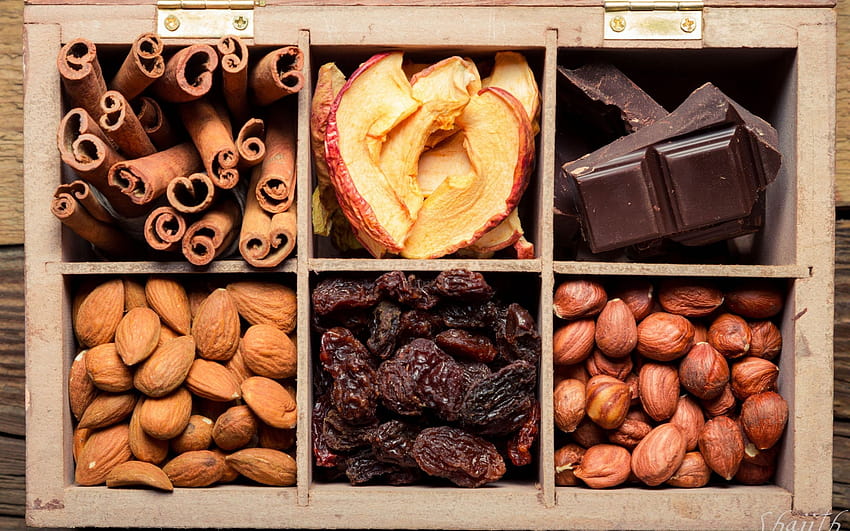 Nuts dried fruit chocolate raisins apples cinnamon almonds hazelnuts box, dry fruits HD wallpaper