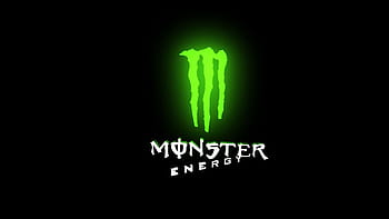 Download Monster Energy Drink On Grass Wallpaper | Wallpapers.com