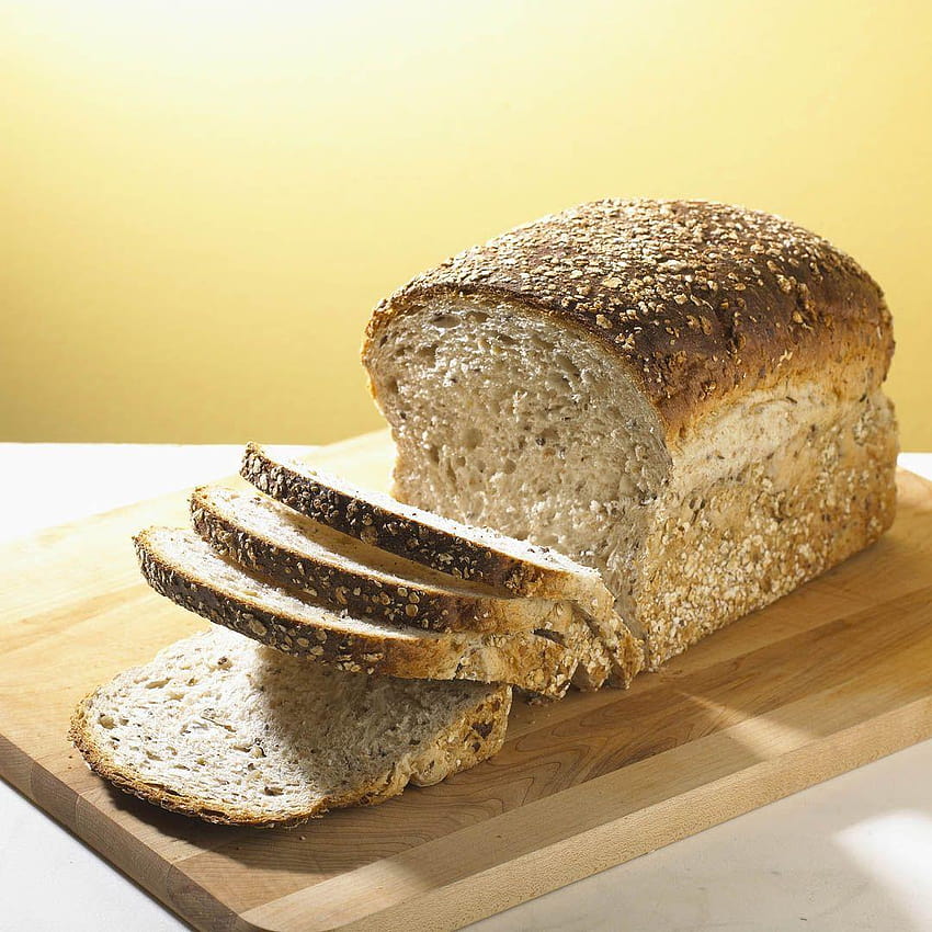 Miche de pain de grains entiers en tranches, pain de blé Fond d'écran de téléphone HD