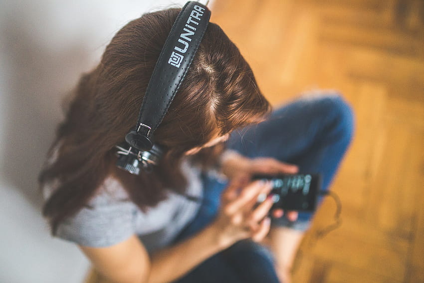 Woman with headphones listening music · Stock, use headphones HD wallpaper