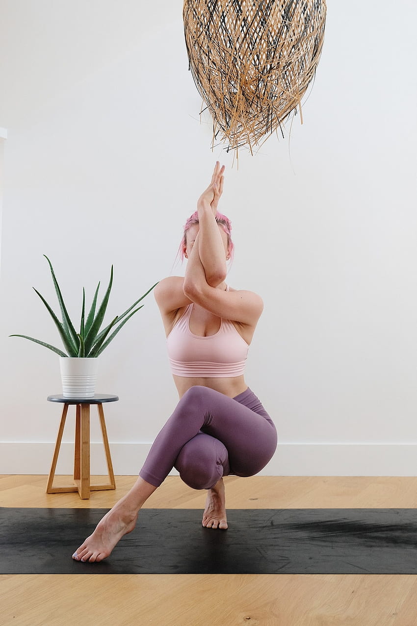 Premium AI Image | Woman doing yoga pose with sky background