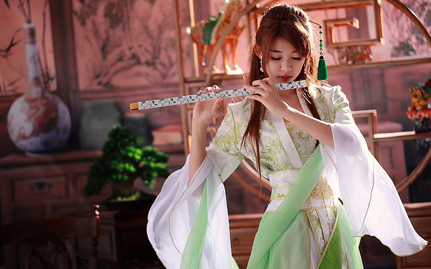 Hermosa niña china, música, flauta fondo de pantalla