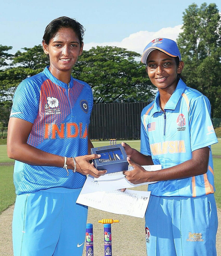 Harmanpreet Kaur with Malaysian Captain in a match between India HD phone wallpaper